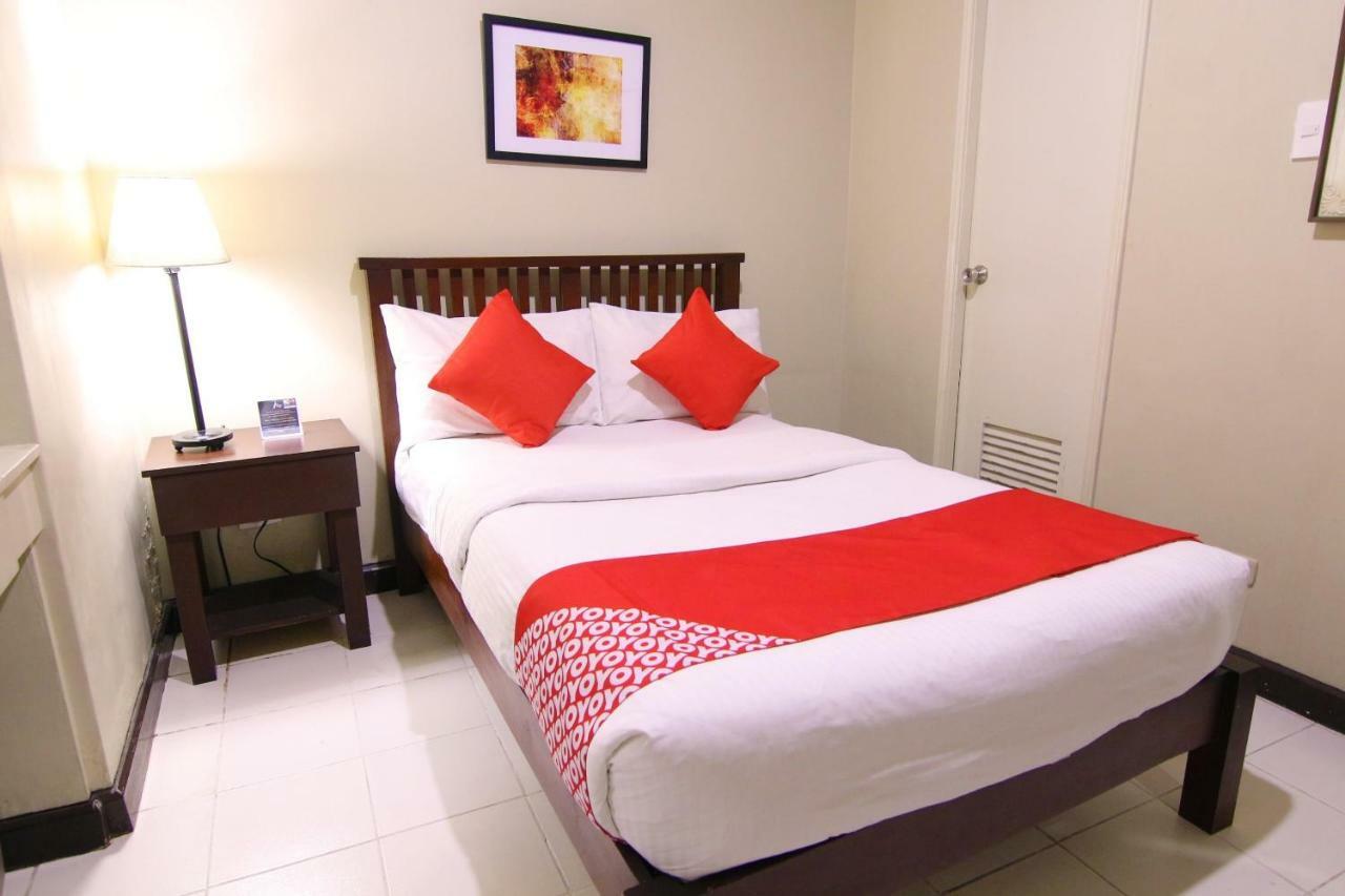 Oyo 103 Artina Suites Hotel Макати Экстерьер фото