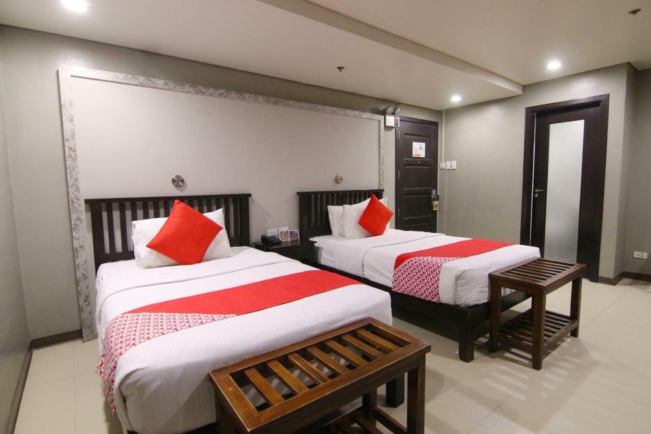 Oyo 103 Artina Suites Hotel Макати Экстерьер фото